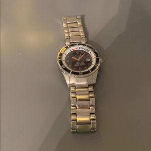 A silver Mets watch
